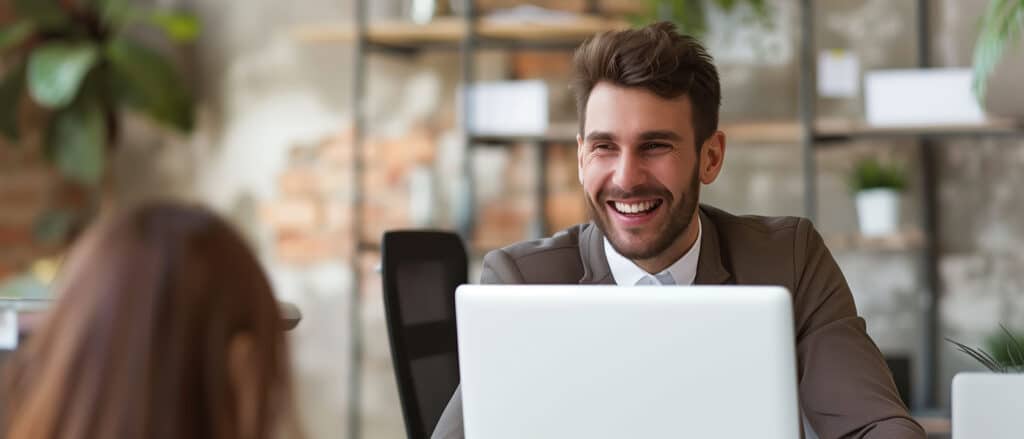 Smiling male employer or business personnel recruiter greeting j